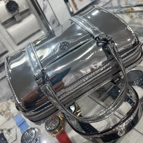 MICHAEL KORS Jet Set Small Patent Duffel Xbody Crossbody Bag
Silver 
NWT - Picture 12 of 16